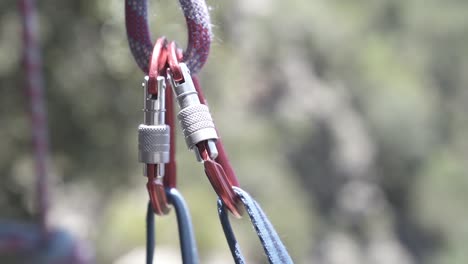 climber man ready for climbing, rope is ready with hooks