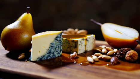 gourmet cheese and pear platter with honey and nuts