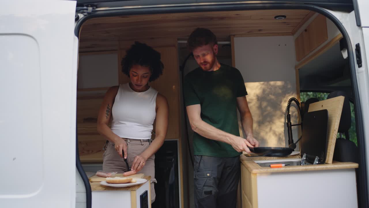 Couple Cooking in Campervan
