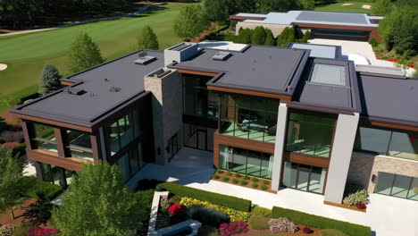 modern luxury home overlooking a golf course