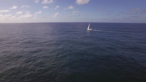 yacht sailing in the ocean aerial view