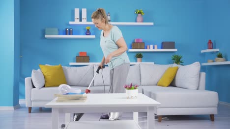 The-woman-sweeping-the-house.
