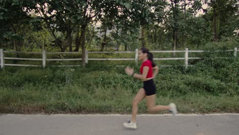 rural countryside road with running woman