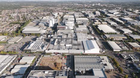 establishing aerial view of slough industrial estate with prominent mars wrigley factory, showcasing expansive rooftops and structured factory layout