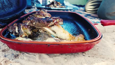 grilled lamb chops barbecued over embers in the middle of the desert in bivouac