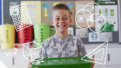 Multiple-math-concept-icons-against-portrait-of-caucasian-boy-with-recycle-tray-smiling-at-school