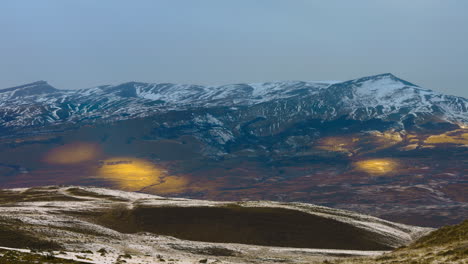 rolling sun light across torres del paine snowy landscape