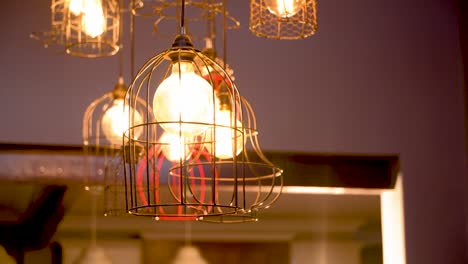 gorgeous lights hanging from the ceiling in a coffee shop