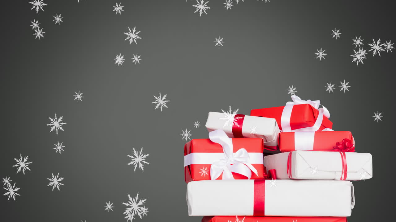 animación digital de copos de nieve cayendo sobre regalos de navidad contra un fondo gris