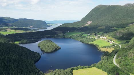 Mountain-Lake-and-Fjords-in-Rodven,-More-og-Romsdal,-Norway---Aerial-4k-Circling