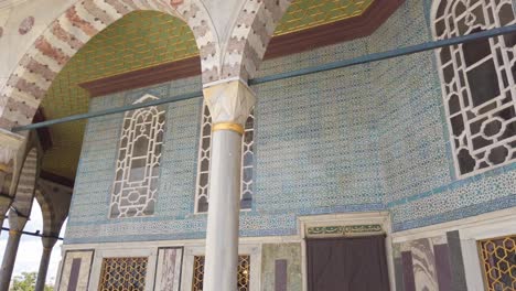 daytime, cinematic slow-mo, the exterior motifs of topkapi palace's bagdat kosku, moving gently from right to left