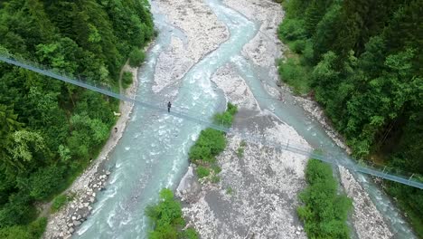 suspension bridge over a mountain river