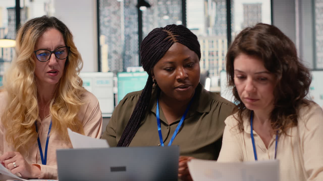 Vertical Video Businesswomen harness the power of analytics and teamwork