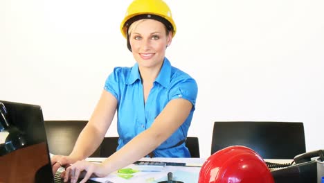 Female-architect-using-a-laptop-in-office-footage