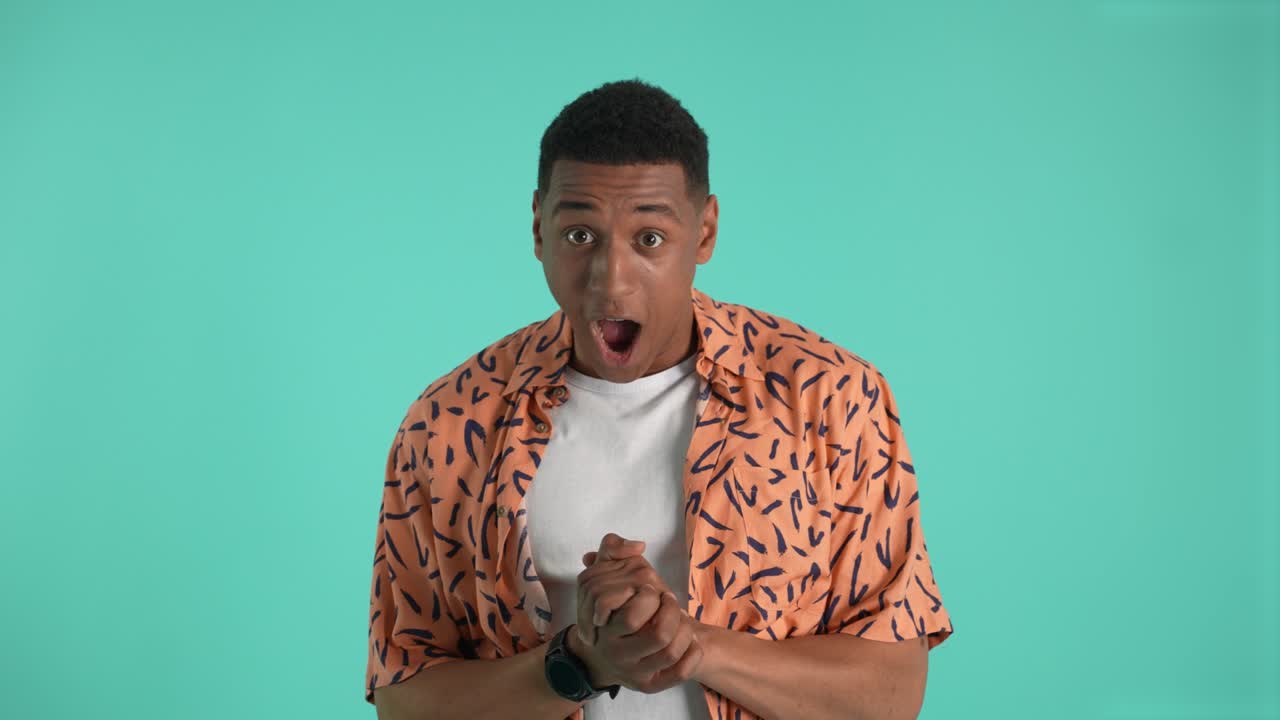 Expressive man saying wow isolated on background