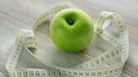 Green-apple-and-tape-measure-