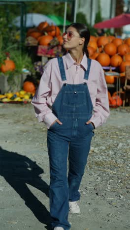 young woman at a pumpkin patch