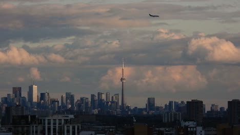 spectacular cityscape timelapse of ontario with clouds building casting a shadow over the city buildings, toronto canada