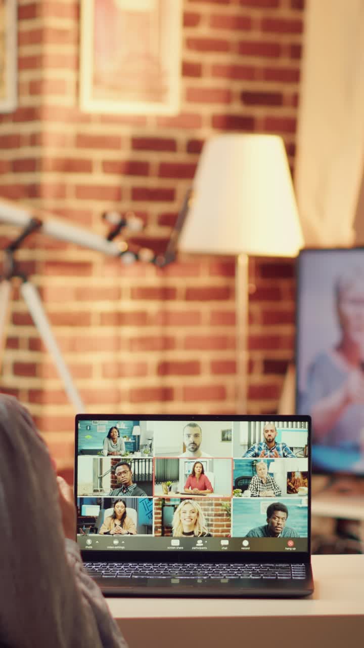 Vertical Person attends videocall with people