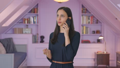 Indian-girl-talking-to-someone-on-call