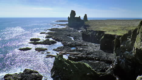 londrangar - basaltic rock formation pinnacles on snaefellsnes peninsula, iceland view from hellnar