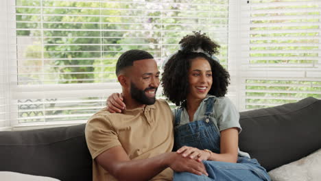 couple, hug or forehead kiss on sofa in relax