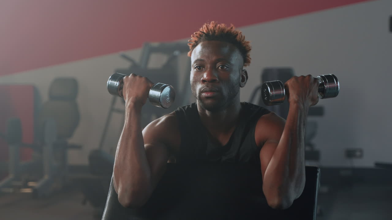 Man Working Out in Gym