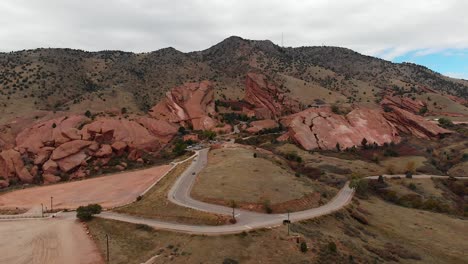 aerial shot moving from left to right at red rocks amphitheater in the fall.