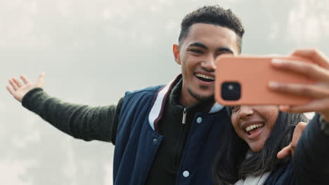 selfie, travel and a couple hiking in nature