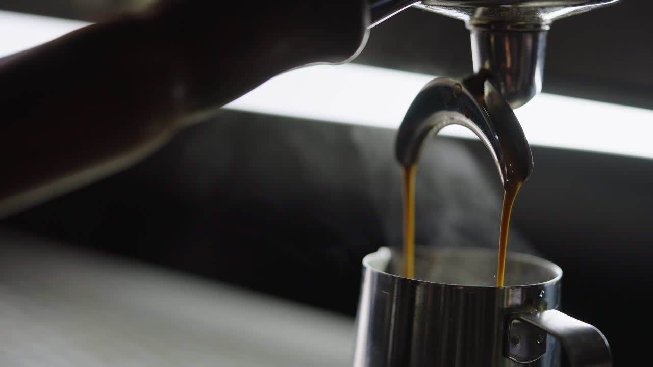 Espresso Being Poured into a Pitcher