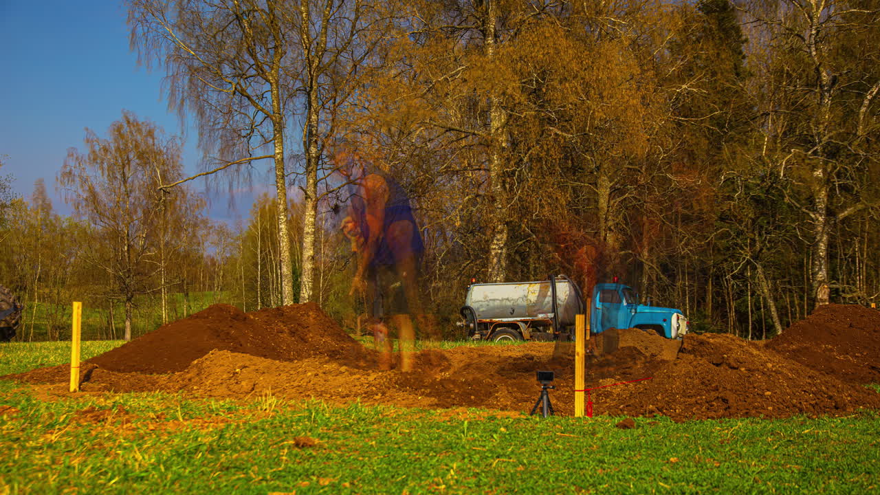 People are digging the foundation for a country house. Time lapse shot.