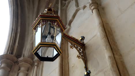 vintage street lamp hanging in the westminster abbey exterior facade