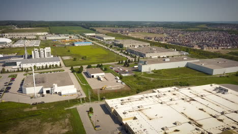 drone panning across a vast industrial district