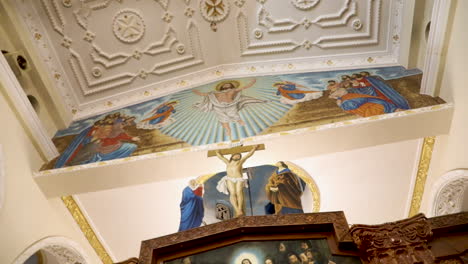 interior architectural paintings and artistic ceilings in the ceiling of the church - low angle