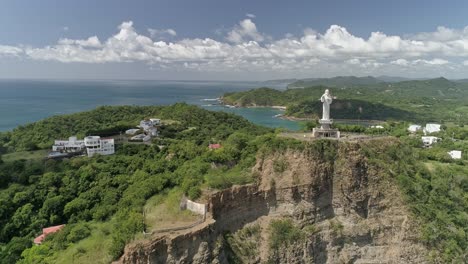 cristo de la misericordia in san juan del sur, nicaragua, aerial dolly backward