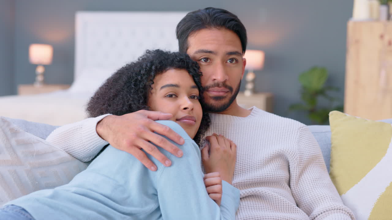 Young couple watching tv, media and movies
