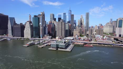 September-2021---4K-aerial-of-lower-Manhattan-from-the-East-River,-NYC,-USA