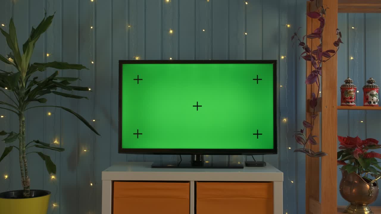 Christmas TV with green screen composited. TV or television - green screen - room - on the table