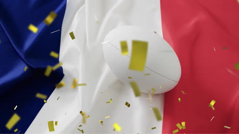 animation of confetti over white rugby ball and flag of france