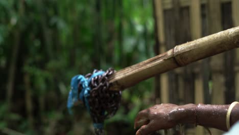 black african technician hands close up working on water pump for extraction of drinkable water