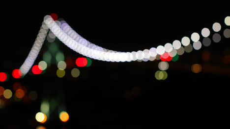 Buntes-Bokeh-Der-Hängebrücke-Bei-Nacht-4k