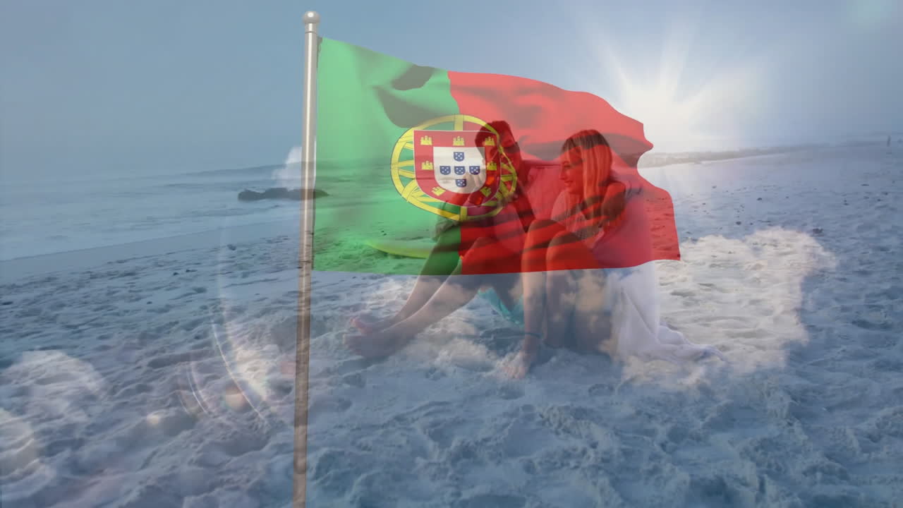 Sitting on beach, couple watching Portugal flag waving in animation background