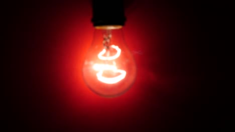 light bulb on red background