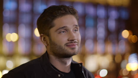 Calm-man-face-dreaming-outdoors.-Handsome-guy-thinking-on-dark-city-street.