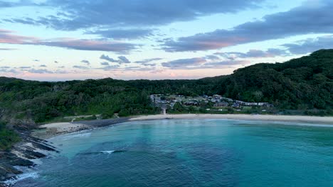 looking over the bay at sunset at seal rocks in australia