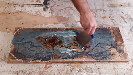 making epoxy art with wood and epoxy resin