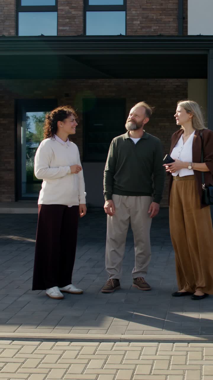 Group of people looking at a new house