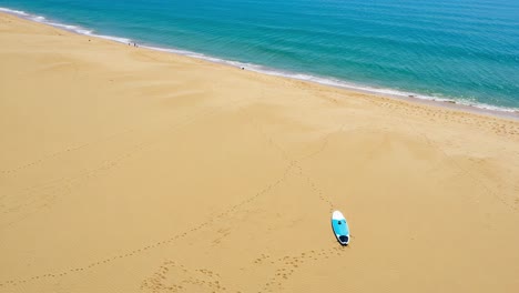 A Serene Beach Scene Featuring an Isolated Boat on Golden Sands with Calm Waters, Inviting Peaceful Reflection and Natural Beauty