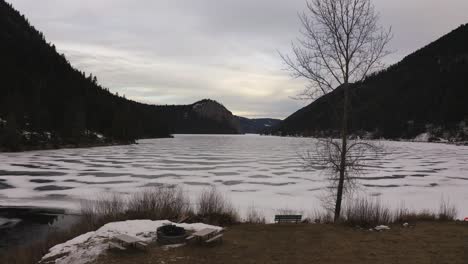 Paul-Lake-in-Winter:-An-Enchanting-Experience-that-Envelops-You-in-a-World-of-Glistening-Snow-and-Breathtaking-Evergreen-Forests-in-Kamloops,-British-Columbia