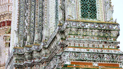 close-up views of wat arun's ornate architecture